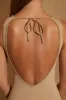 Ribbed Cut Out Back Jumpsuit in Tan sold by Oh Polly