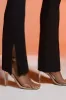 Petite Split Flare Trousers in Black sold by Oh Polly