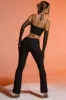 Petite Split Flare Trousers in Black sold by Oh Polly
