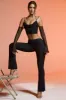 Petite Split Flare Trousers in Black sold by Oh Polly