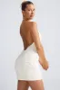 Floral-Appliqué Halterneck A-Line Mini Dress in White sold by Oh Polly