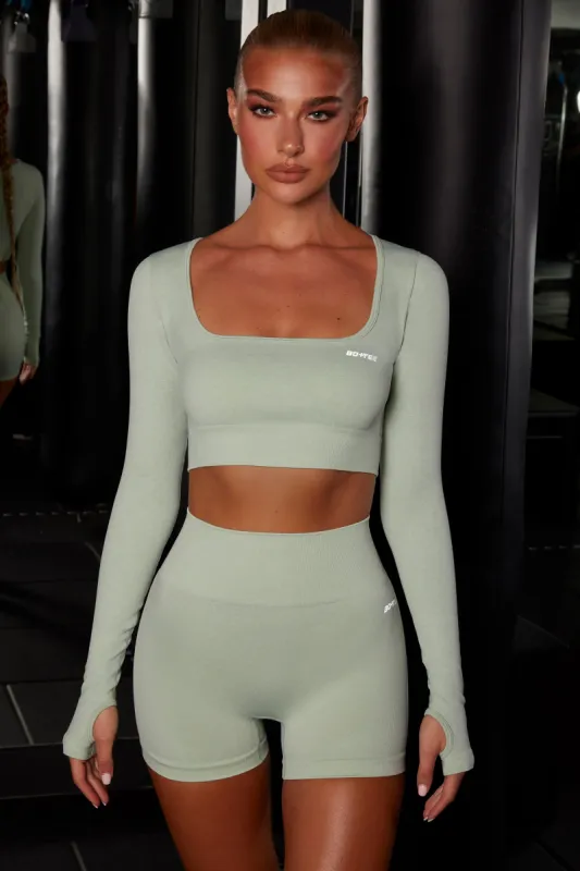 Motion Seamless Long Sleeve Crop Top in Green sold by Oh Polly