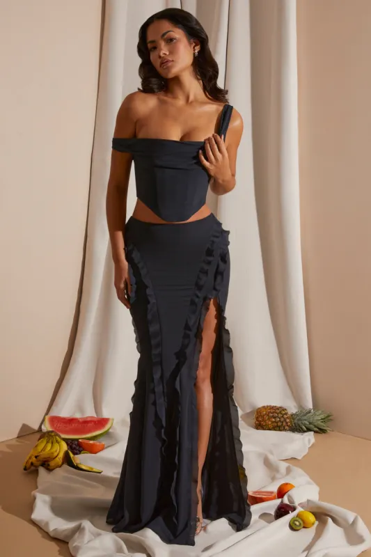 Mid Rise Ruffle Detail Maxi Skirt in Black sold by Oh Polly