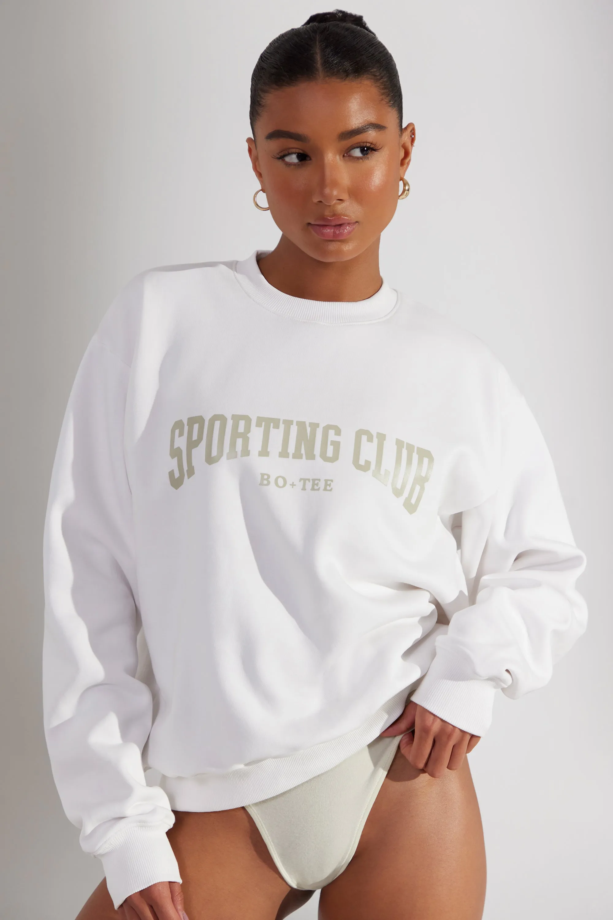 Oversized Sweatshirt in White sold by Oh Polly