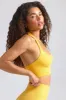 Define Luxe Halterneck Sports Bra in Golden Yellow sold by Oh Polly