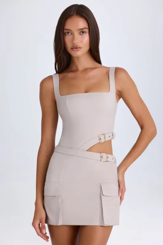 Belted Cut-Out Mini Dress in Taupe sold by Oh Polly