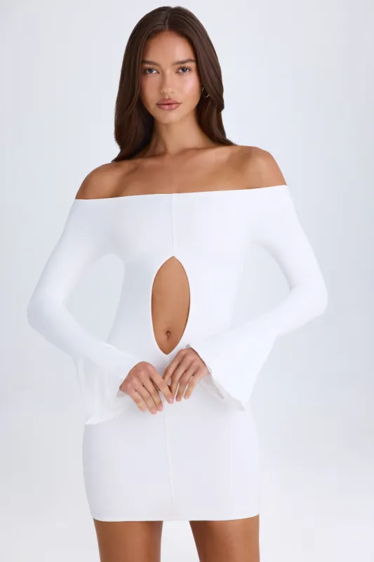 Off-Shoulder Cut-Out Mini Dress in White sold by Oh Polly