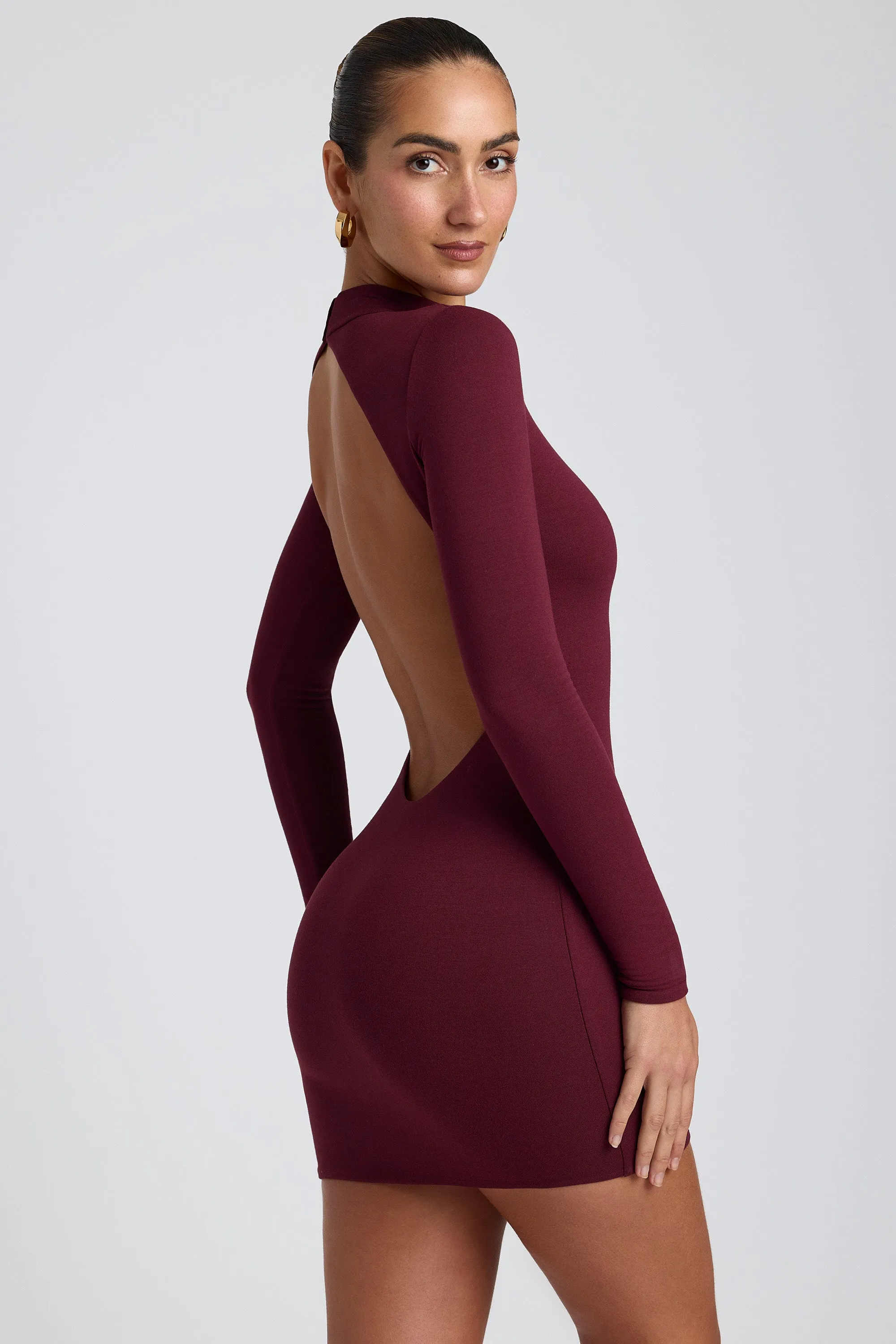 Modal Open-Back Long-Sleeve Mini Dress in Plum sold by Oh Polly