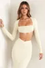 Cut Out Back Long Sleeve Crop Top in Ivory sold by Oh Polly