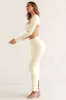 Cut Out Back Long Sleeve Crop Top in Ivory sold by Oh Polly