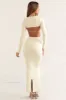 Cut Out Back Long Sleeve Crop Top in Ivory sold by Oh Polly