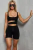 Play Hot & Cold Cut Out Playsuit in Black sold by Oh Polly