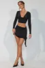 Slinky Jersey Mid Rise Ruffle Layer Mini Skirt in Black sold by Oh Polly