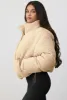 Terry Fleece Puffer Jacket in Beige sold by Oh Polly