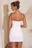 Ruched Bust Cut Out Mini Dress in White sold by Oh Polly