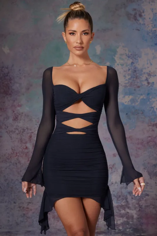 Twist Cut Out Long Sleeve Mini Dress in Midnight Black sold by Oh Polly
