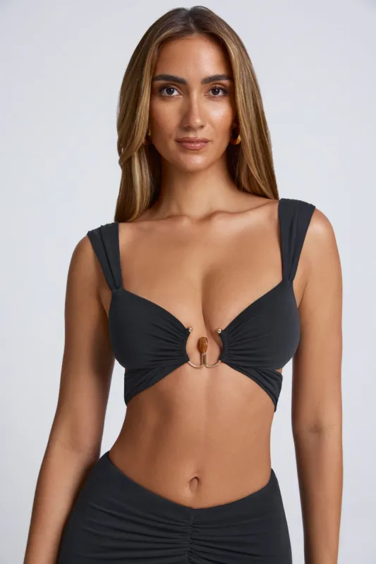 Hardware Detail Cut-Out Crop Top in Black sold by Oh Polly