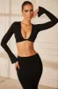 Long Sleeve Front Twist Crop Top in Black sold by Oh Polly