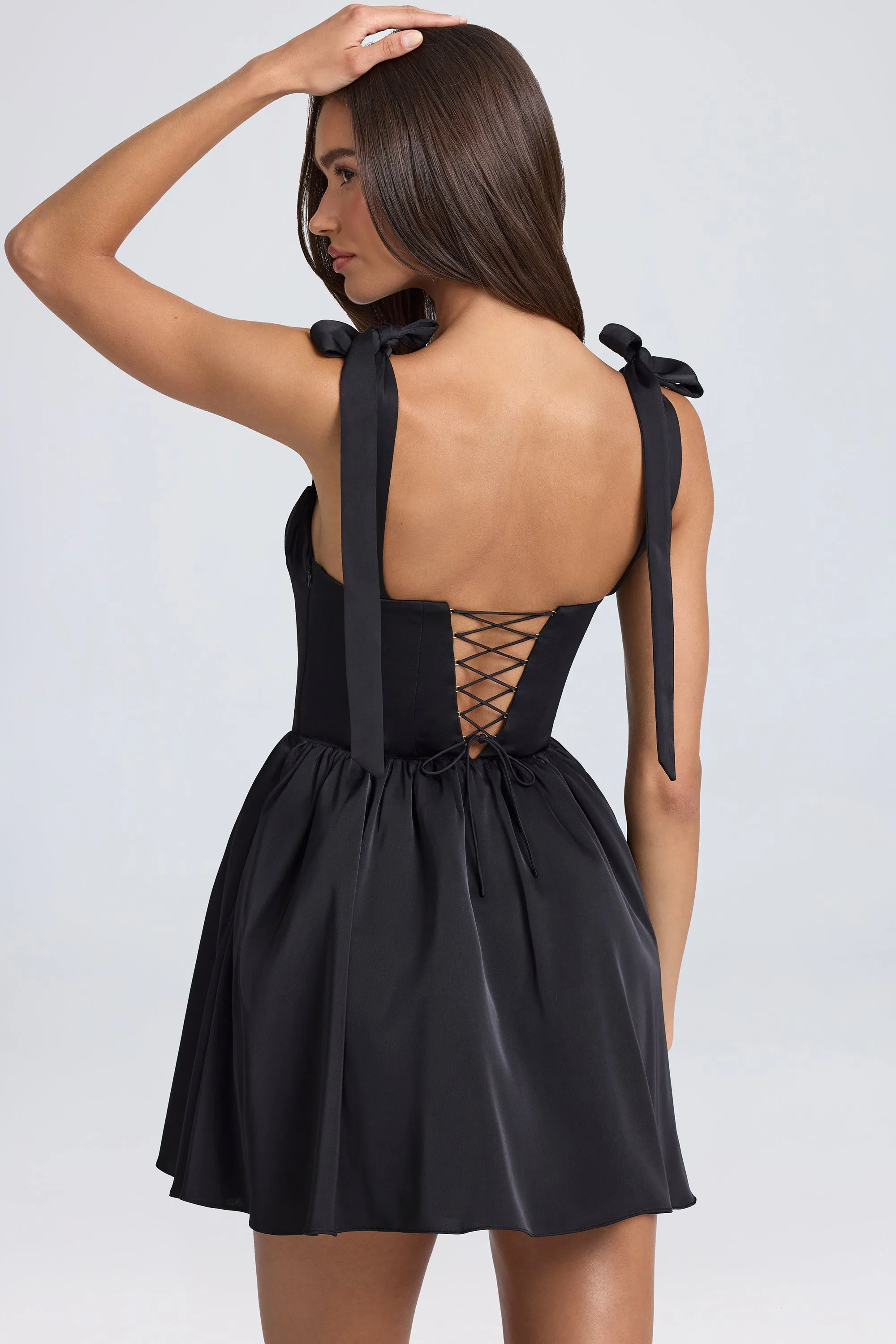 Draped Corset Mini Dress in Black sold by Oh Polly product image thumbnail 2