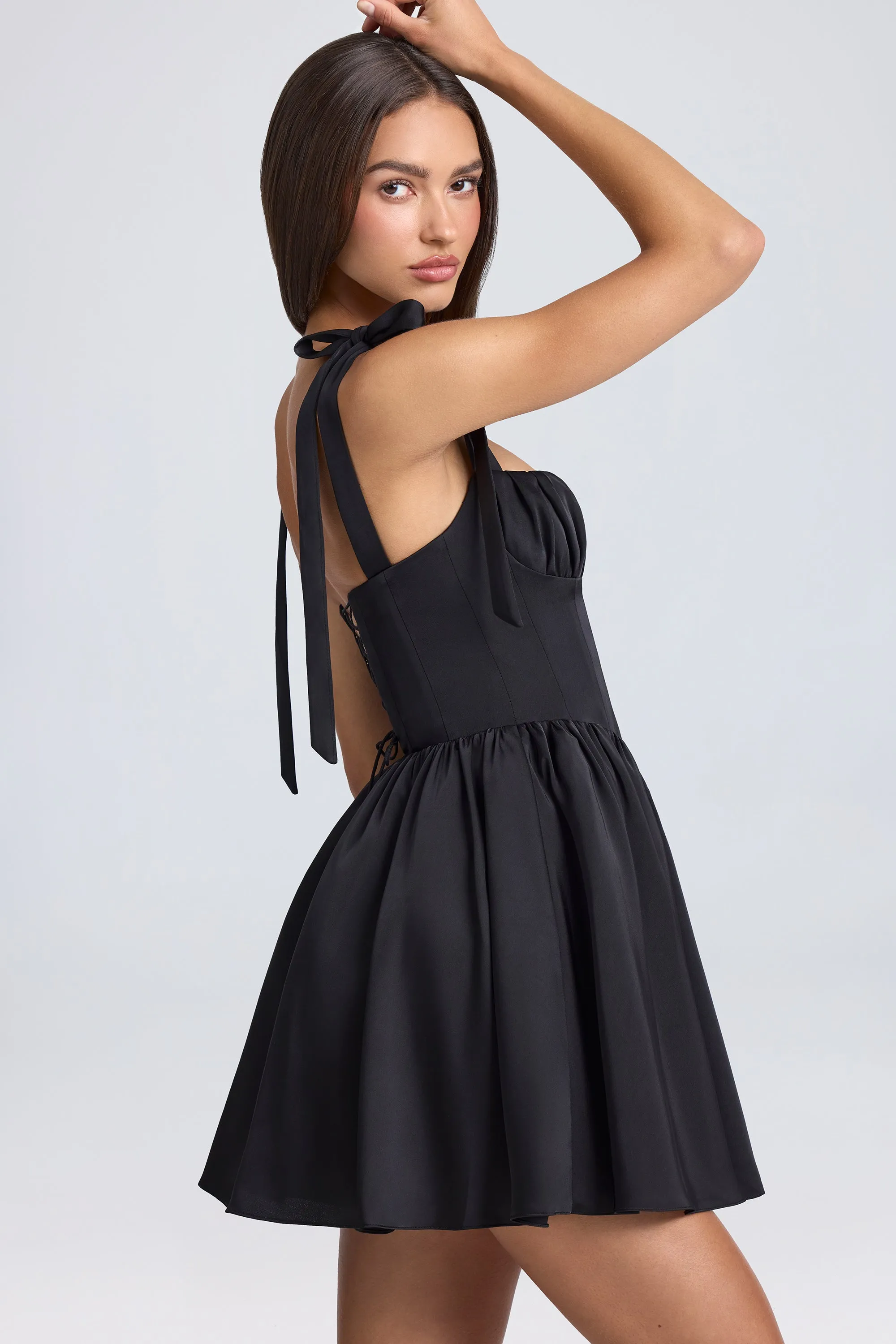 Draped Corset Mini Dress in Black sold by Oh Polly product image thumbnail 3