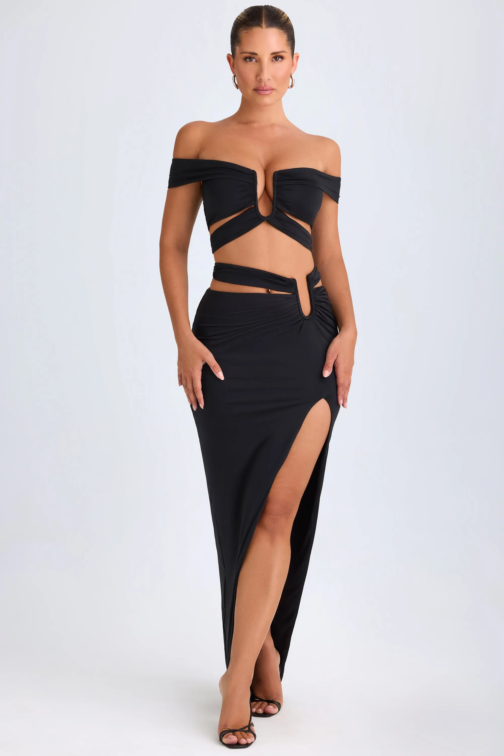 Asymmetric Cut-Out Maxi Skirt in Black sold by Oh Polly product image thumbnail 5