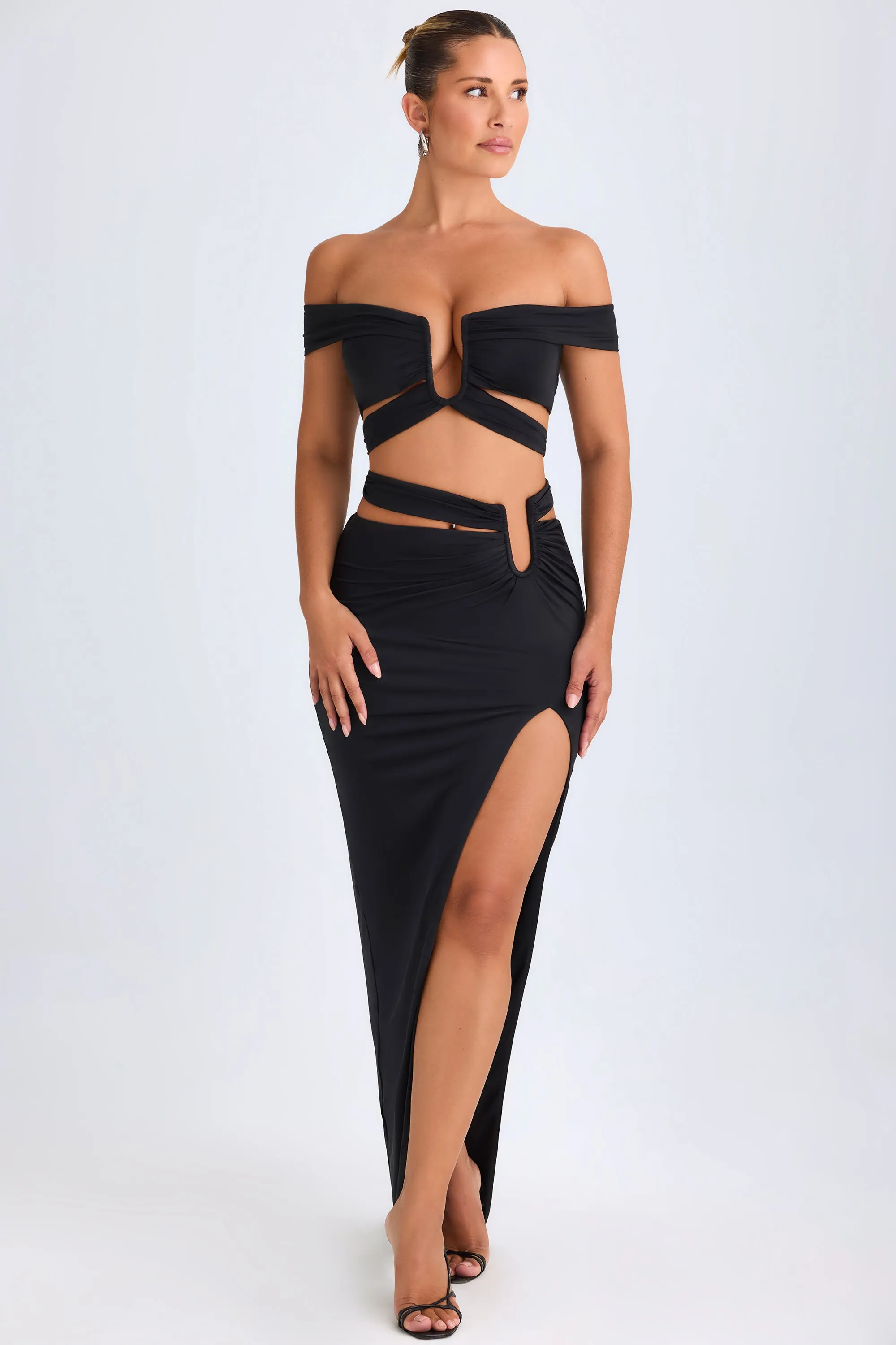 Asymmetric Cut-Out Maxi Skirt in Black sold by Oh Polly product image thumbnail 4