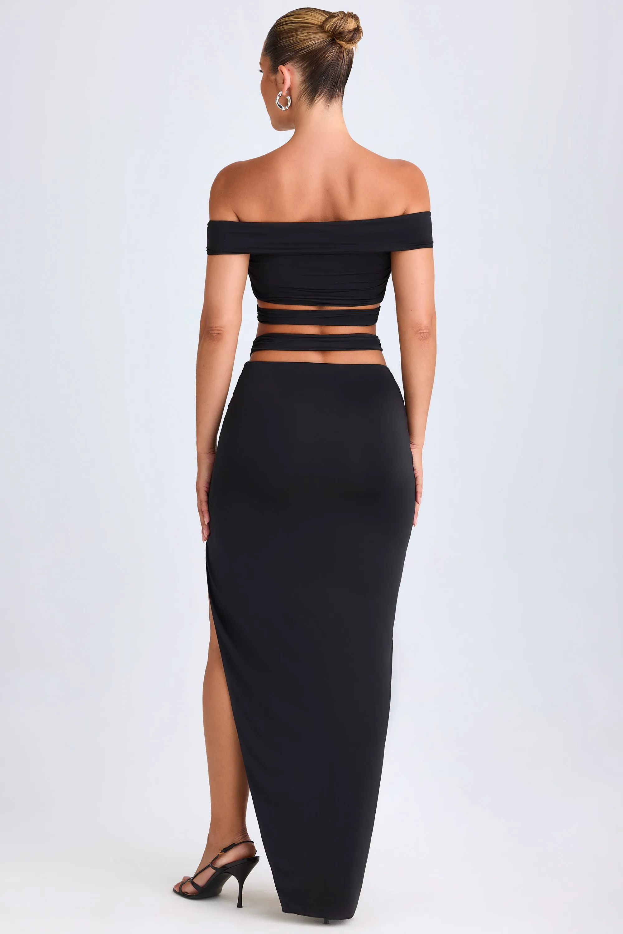Asymmetric Cut-Out Maxi Skirt in Black sold by Oh Polly product image thumbnail 2