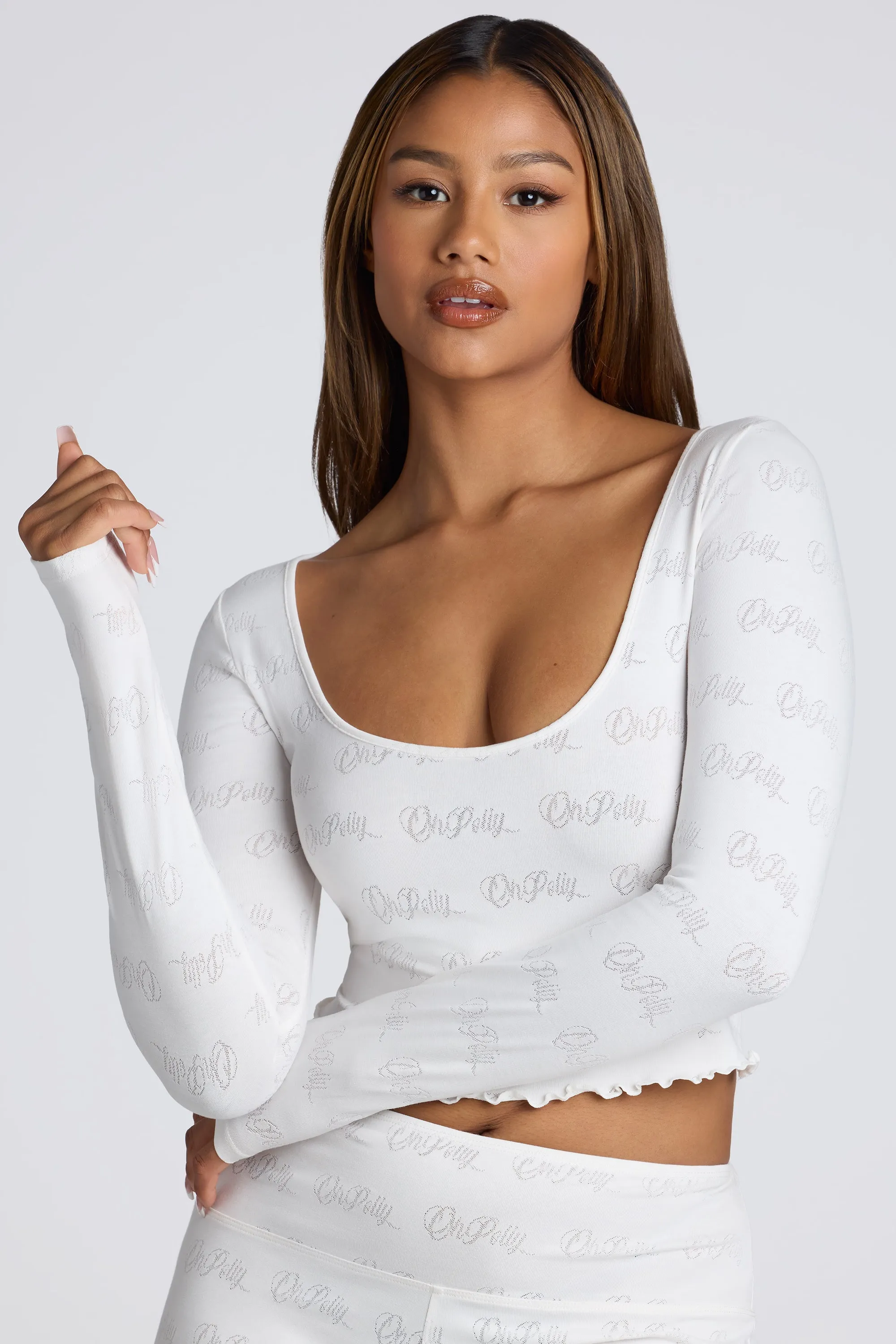 Long Sleeve Scoop Neck Pointelle Crop Top in White sold by Oh Polly product image thumbnail 5