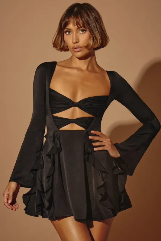 Long Sleeve Bow Mini Dress in Black sold by Oh Polly