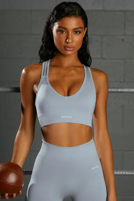 Emerge Cross Strap Seamless Plunge Sports Bra in Blue sold by Oh Polly