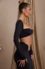 Long Sleeve Ruched Crop Top in Black sold by Oh Polly
