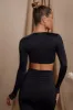 Long Sleeve Ruched Crop Top in Black sold by Oh Polly