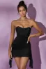 Embellished Corset Mini Dress in Black sold by Oh Polly