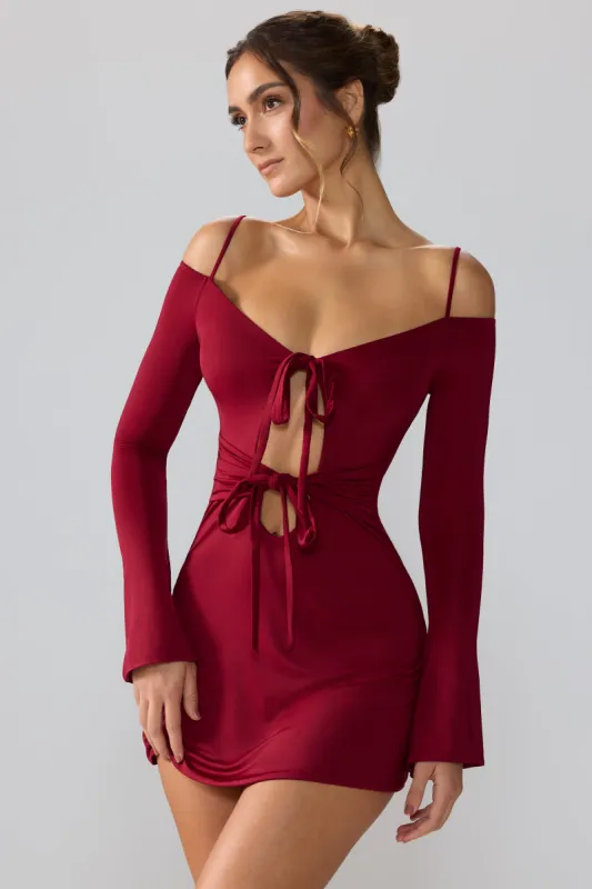 Slinky Jersey Long Sleeve Cut Out Mini Dress in Ruby sold by Oh Polly