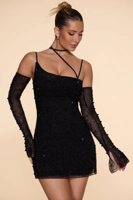 Embellished Asymmetric Corset Mini Dress in Black sold by Oh Polly