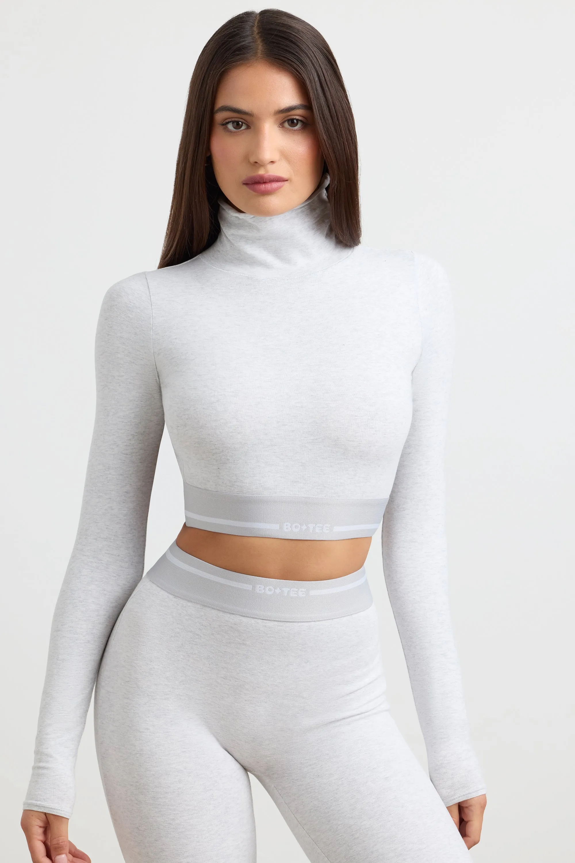 Backless Turtleneck Long-Sleeve Crop Top in Grey Marl sold by Oh Polly