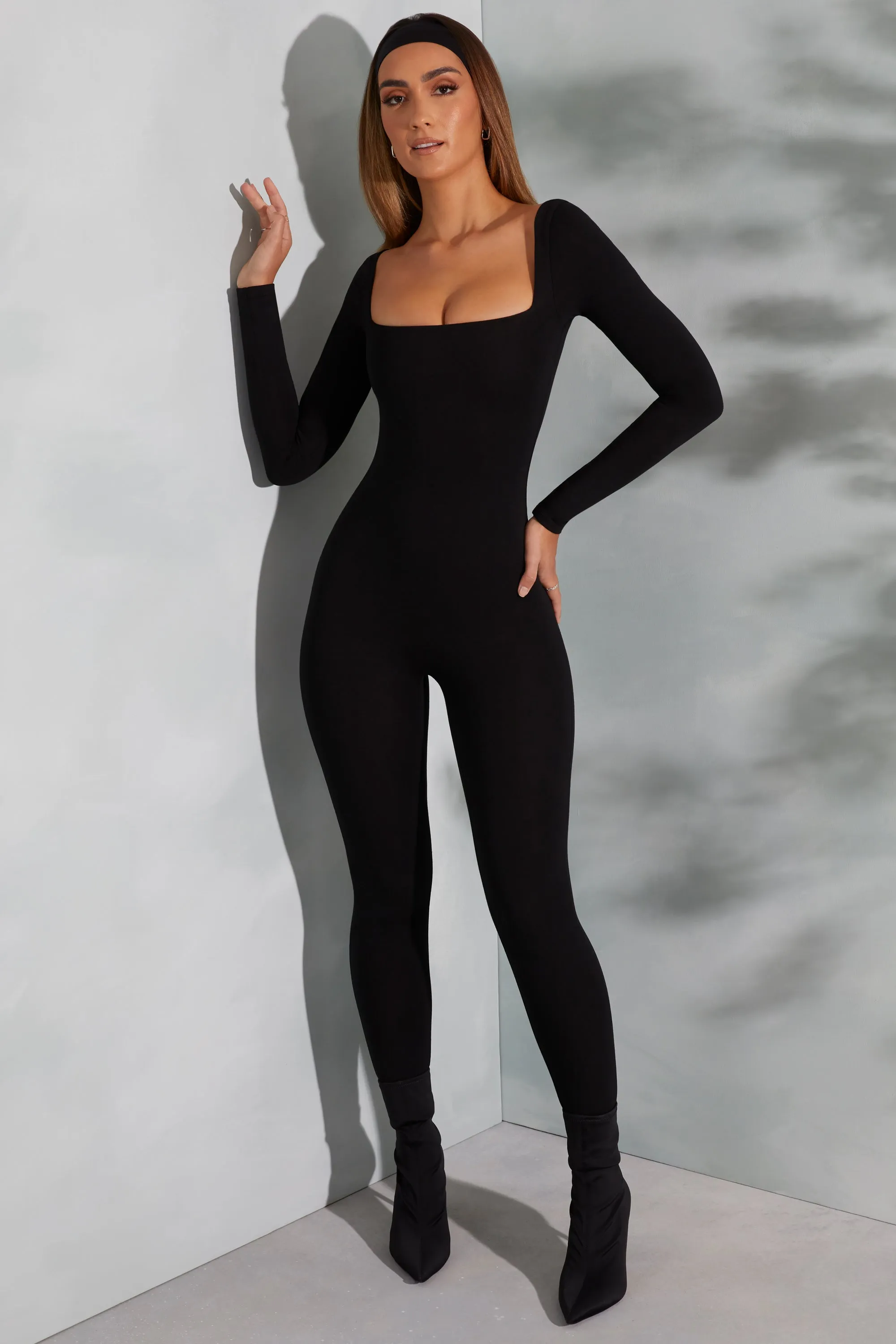 Square Neck Long Sleeve Jumpsuit in Black sold by Oh Polly