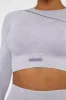 Long Sleeve High Neck Zip Crop Top in Lilac sold by Oh Polly
