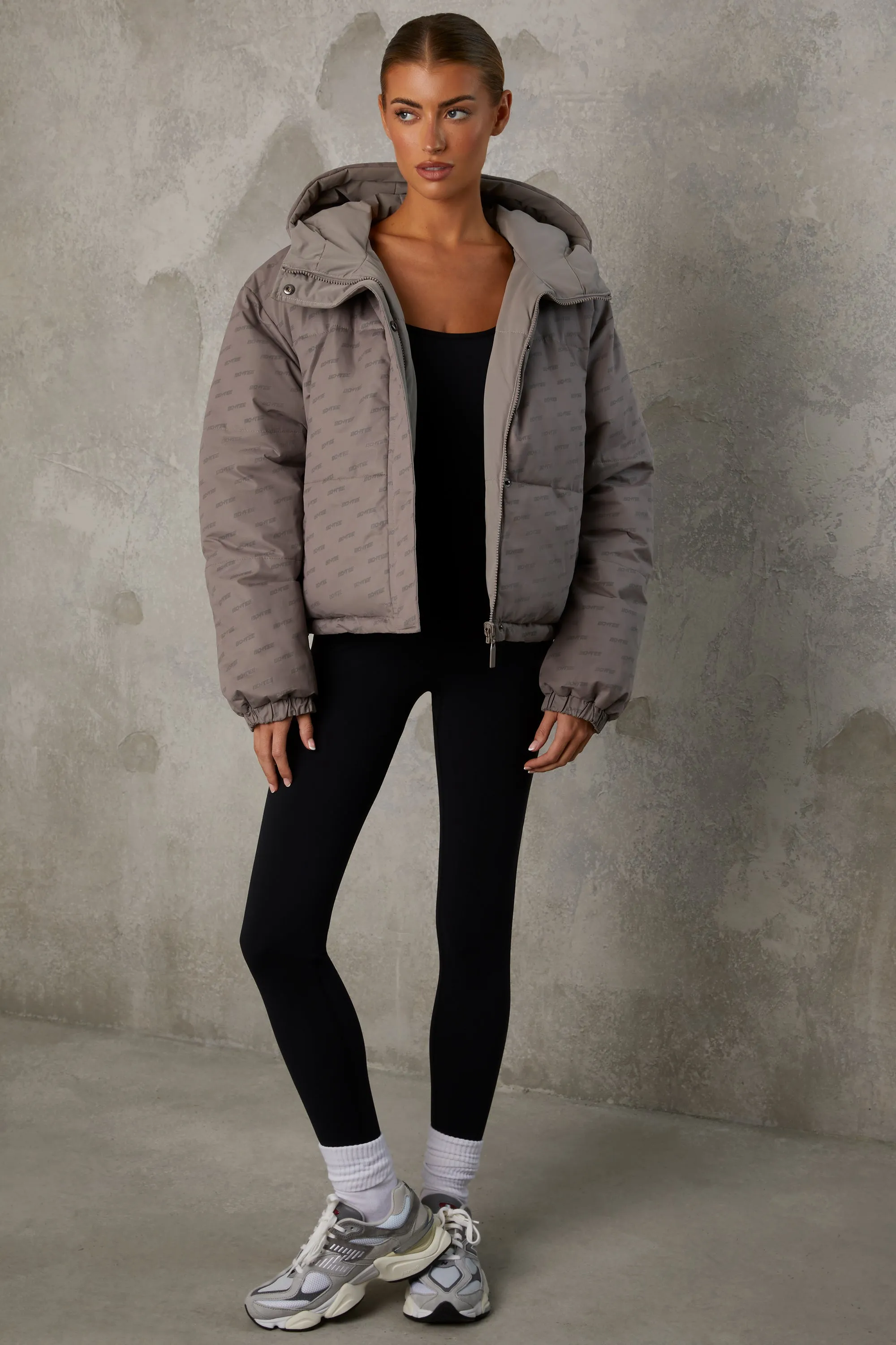 Reversible Hooded Puffer Jacket in Warm Gray sold by Oh Polly product image thumbnail 5