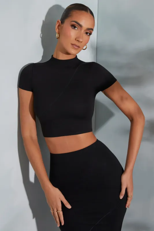 Contrast Stitch Turtleneck Crop Top in Black sold by Oh Polly