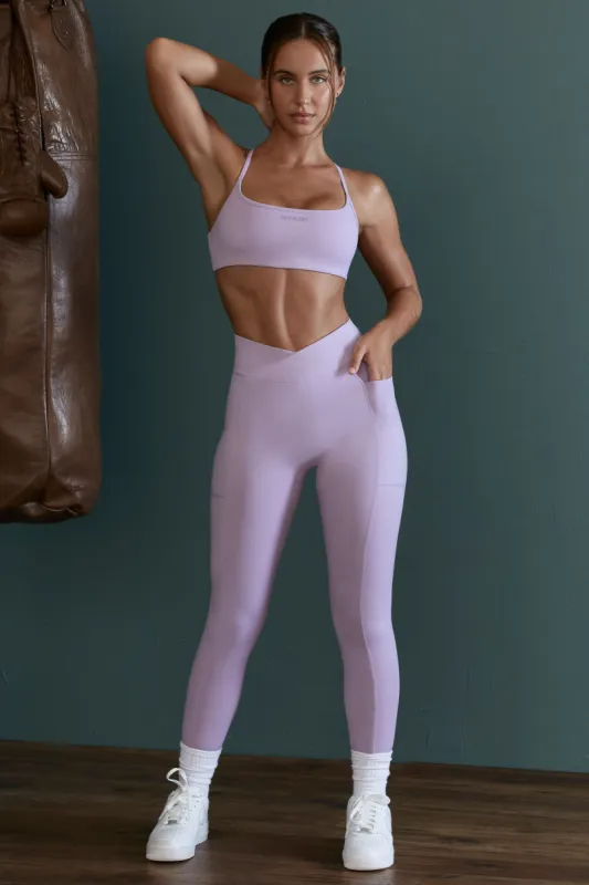 Petite High Waist Wrap Over Leggings in Lilac sold by Oh Polly
