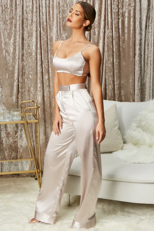 Hide & Sleek Wide Leg Satin Trousers in Silver sold by Oh Polly
