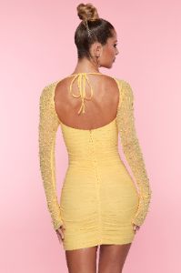 Embellished Long Sleeve Mini Dress in Yellow sold by Oh Polly