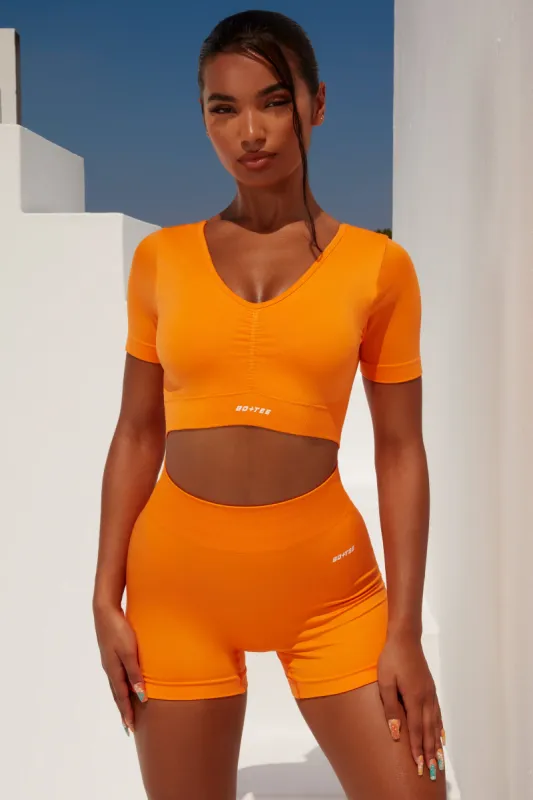 Gradient Scoop Neck Ruched Crop Top in Orange sold by Oh Polly