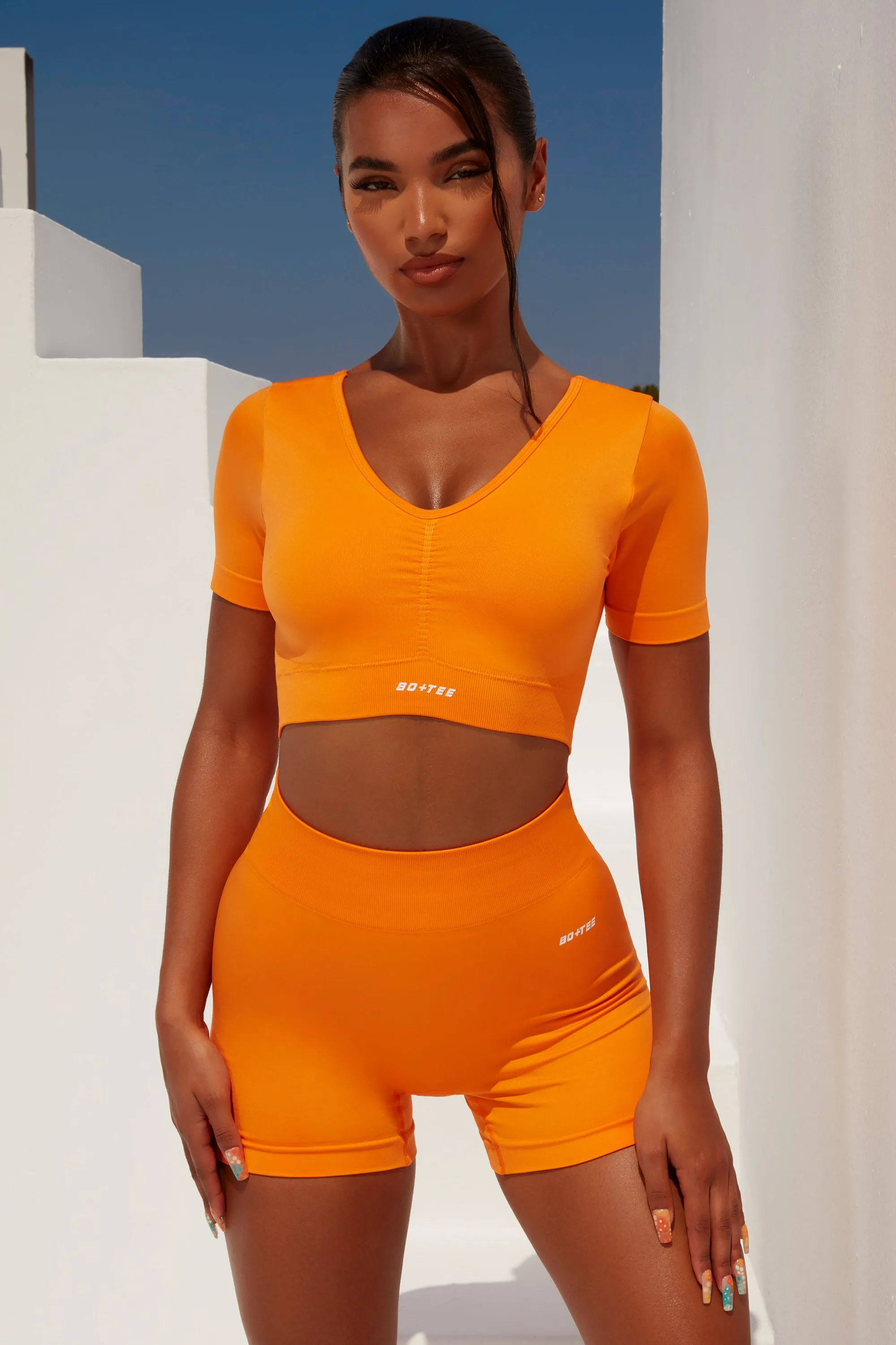 Gradient Scoop Neck Ruched Crop Top in Orange sold by Oh Polly