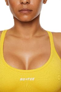 Seamless Strappy Sports Bra in Yellow sold by Oh Polly