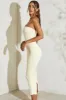 Strapless Flared Hem Midaxi Dress in Ivory sold by Oh Polly