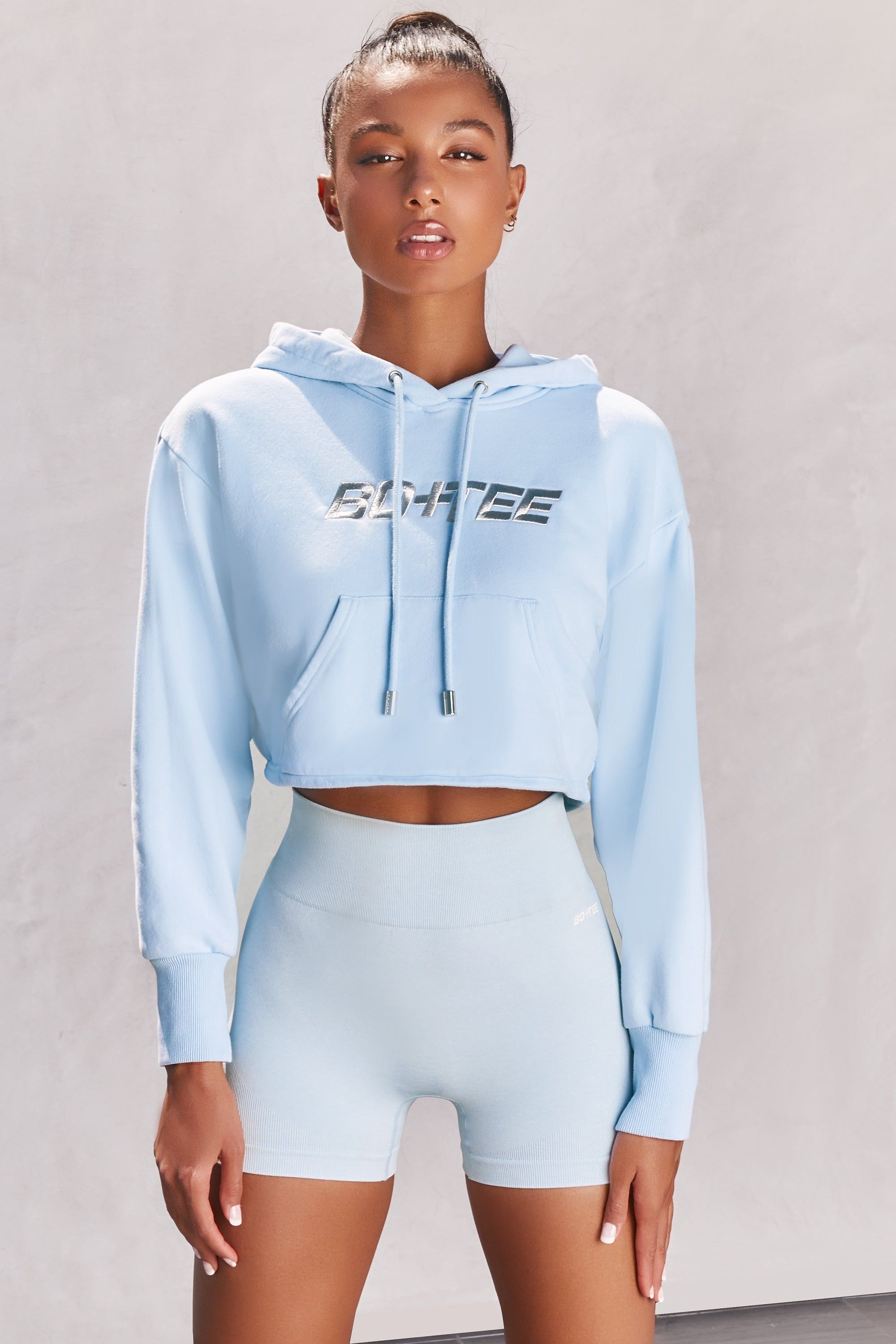 Off Duty Cropped Hoodie in Blue sold by Oh Polly