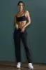 Jogger Bottoms in Black sold by Oh Polly
