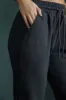 Jogger Bottoms in Black sold by Oh Polly